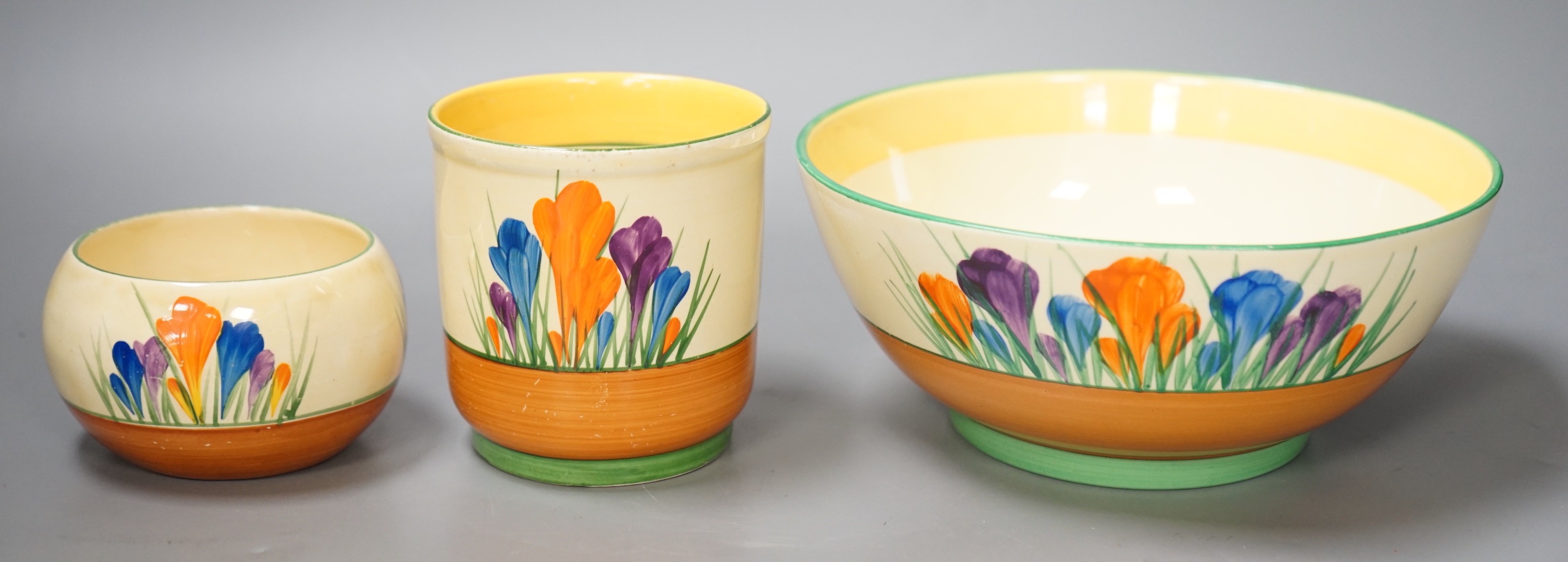 Three pieces of Clarice Cliff Crocus pattern, largest 19cm diameter